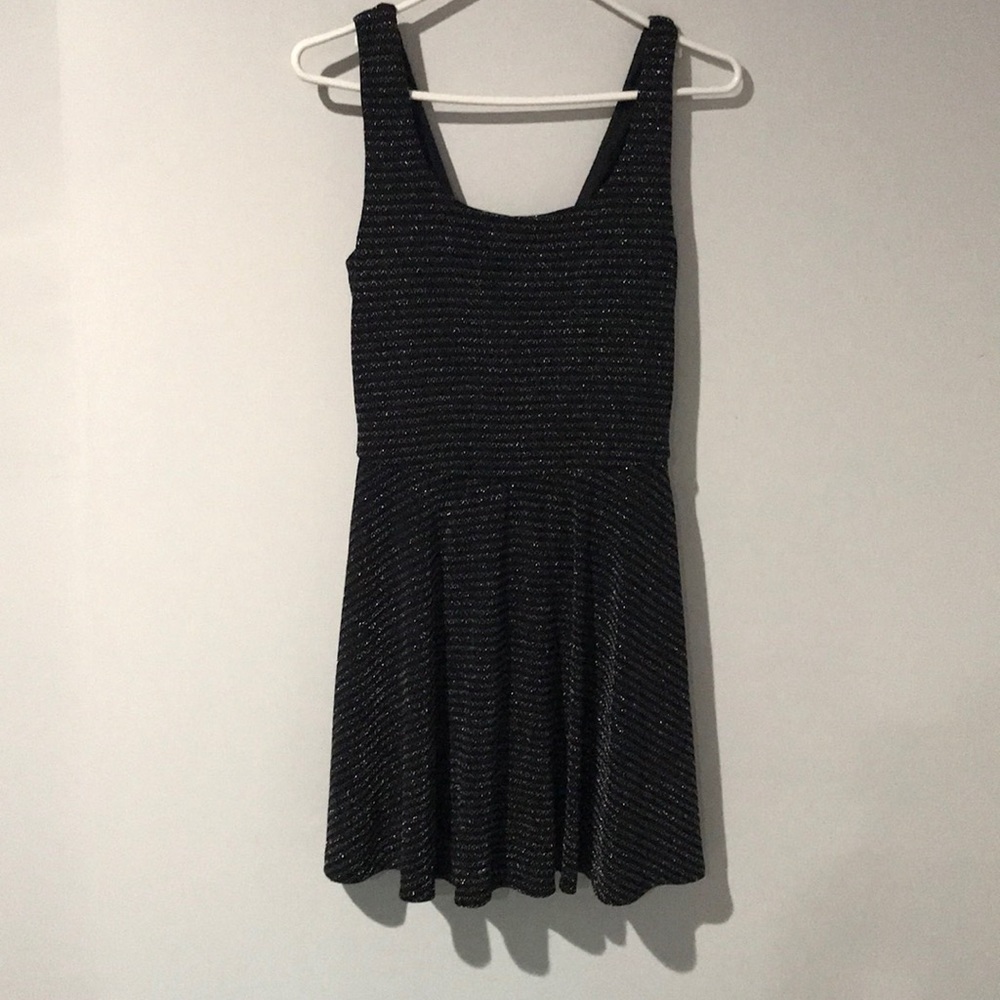Black dress with metallic silver stripes